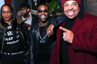 a group of people posing for a picture